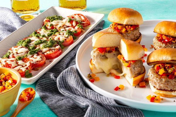 Juicy Lucy sliders with peperonata relish and warm caprese salad