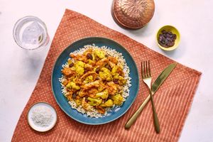 Spicy chicken biryani with brown rice, cauliflower and raisins