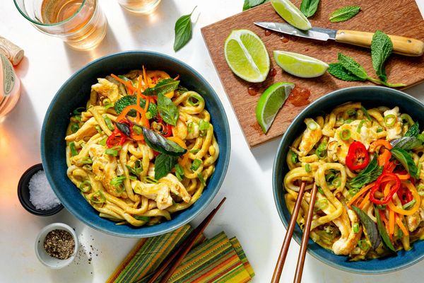 Pork cashew curry with udon and fresh herb salad