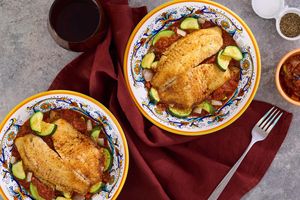 Pan-cooked tilapia with zucchini and puttanesca sauce