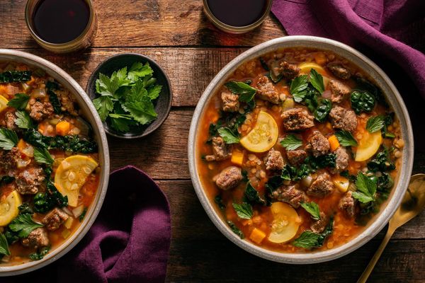 Mediterranean sausage and lentil stew with squash and wilted kale