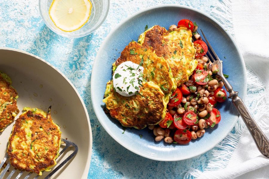 Zucchini fritters with tomato salad and garlic yogurt