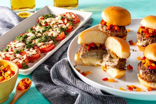 Juicy Lucy sliders with peperonata relish and warm caprese salad