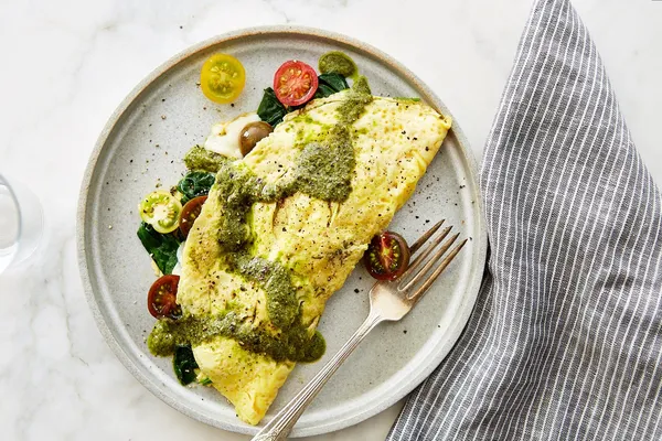 Pesto Caprese Omelet with Mozzarella Cheese & Cherry Tomatoes