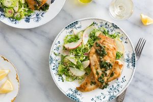Chicken cutlets with piccata sauce and apple-brassica salad