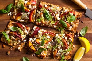 Charred peach and feta flatbreads with frisée salad