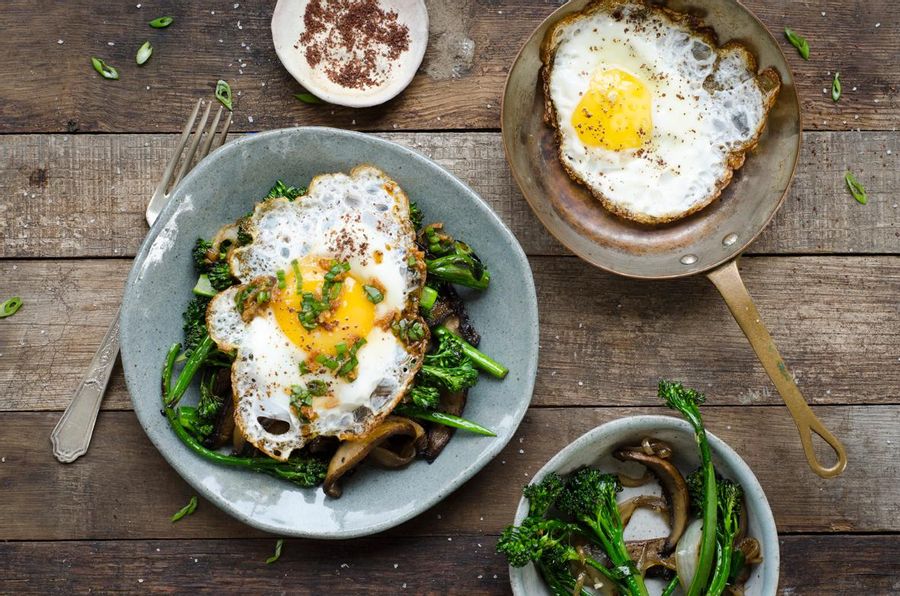 Sautéed portabella mushrooms and broccolini with fried egg 