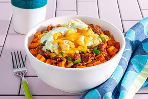 Chorizo and sweet potato scramble with cheddar and chile-lime yogurt