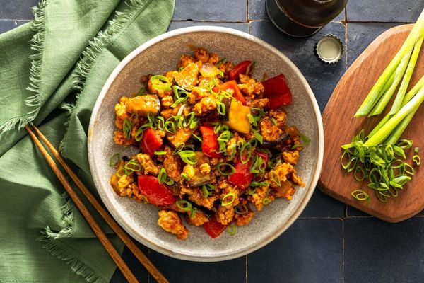 Five-spice pork and eggplant stir-fry with cashew-plum sauce