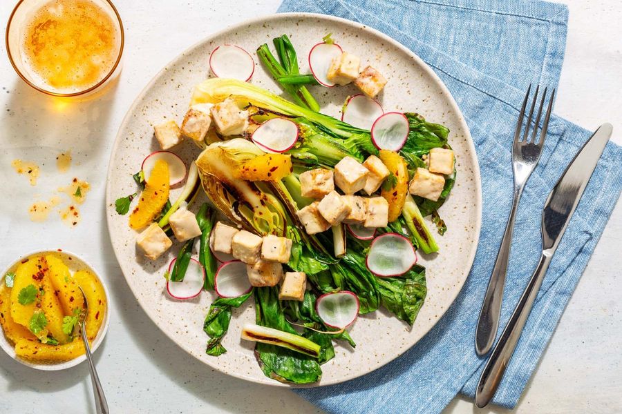 Your choice of protein with cashew-lime glaze, bok choy, and orange salsa