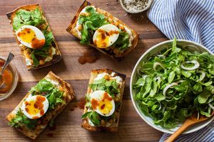 Chickpea tartines with soft-cooked eggs and arugula salad