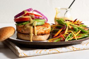 Salmon burgers with honey-mustard mayo and snap pea salad
