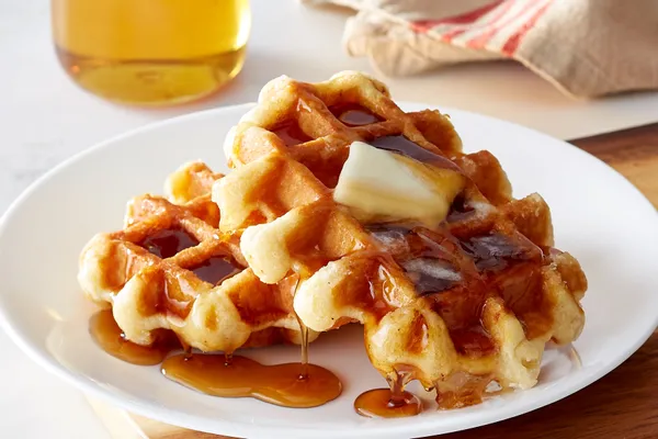Artisanal Belgian Waffles with Maple Syrup & Cinnamon–Brown Sugar Butter