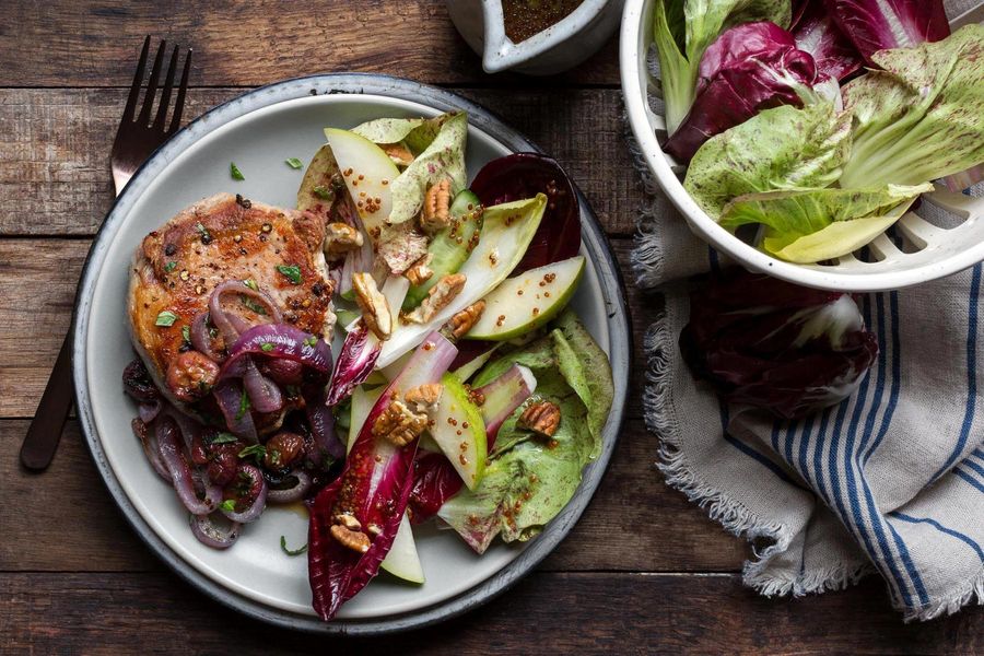 Pork chops with roasted grapes and pear-chicory salad