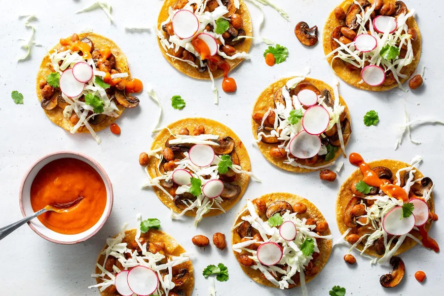 Mushroom tostadas with pinto beans and cabbage slaw