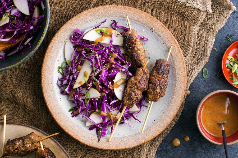 Korean skewers with ginger, pear slaw, and sesame seeds