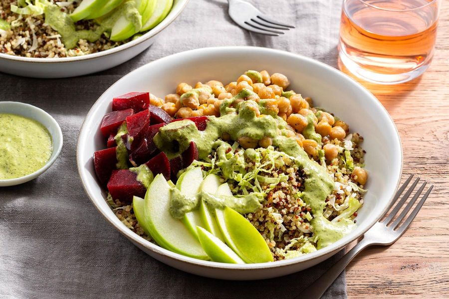 Quinoa and chickpea bowls with beets and tahini goddess dressing
