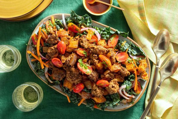 Kale taco salad with ground beef, potatoes, and honey-lime vinaigrette