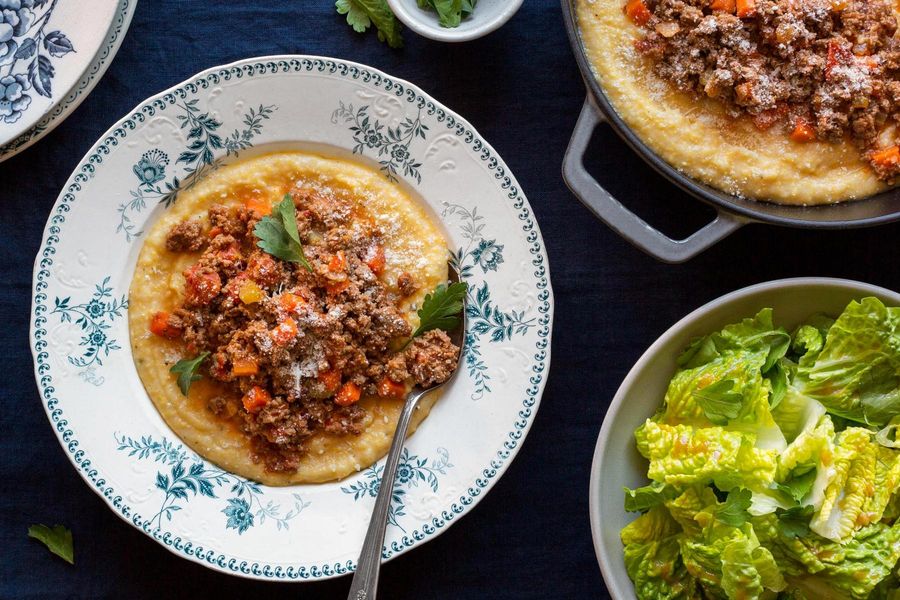 Beef Bolognese with polenta and romaine salad