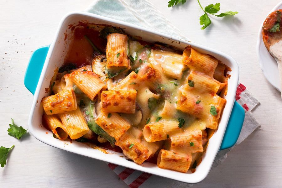 Baked rigatoni with ricotta, mushrooms, and greens