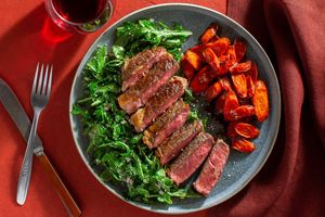 Black Angus rib-eyes with espresso-maple glazed carrots and arugula