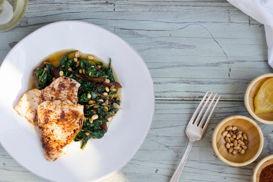 Pan-seared sole with spinach, dates and pine nuts