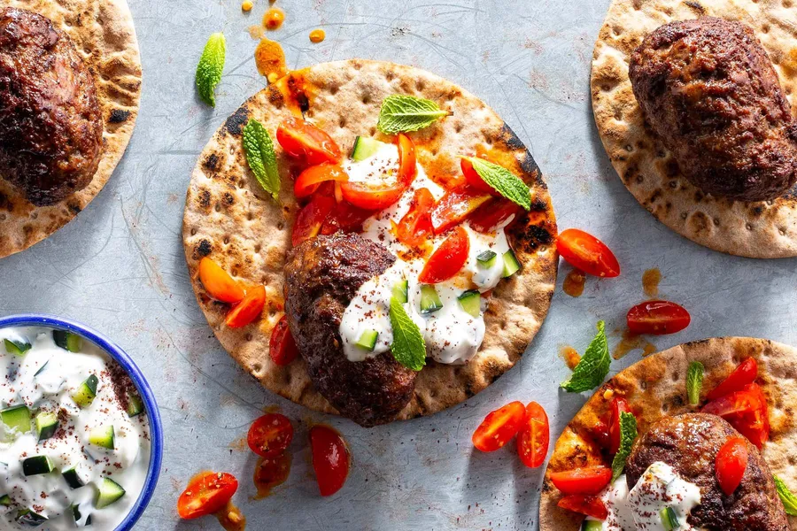 Lamb köfte with tomato relish and tzatziki