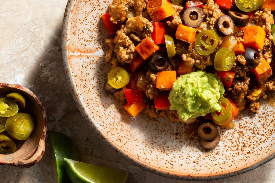 Spicy Southwest beef and sweet potato skillet with guacamole