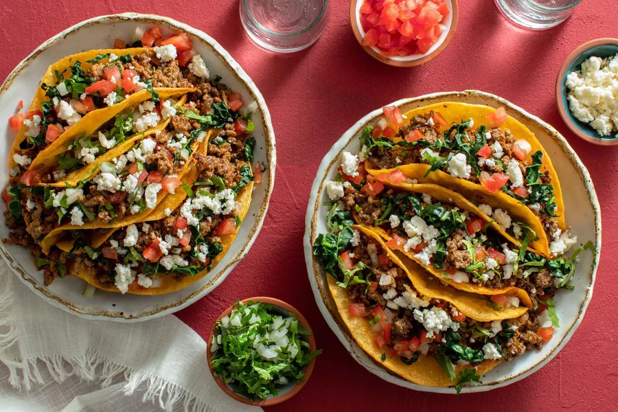 Ground beef street tacos with kale and queso fresco