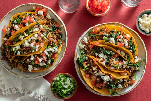 Street tacos with kale, tomato, and queso fresco