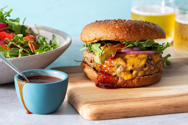 Memphis BBQ cheeseburgers with plum, pecan, and arugula salad