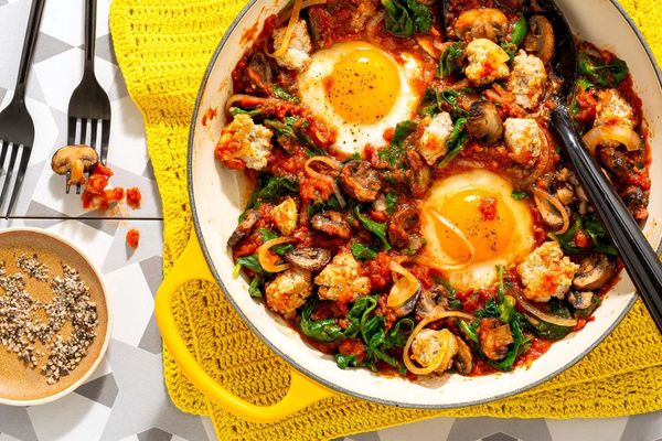 Eggs in purgatory with spicy turkey, mushrooms, and kale
