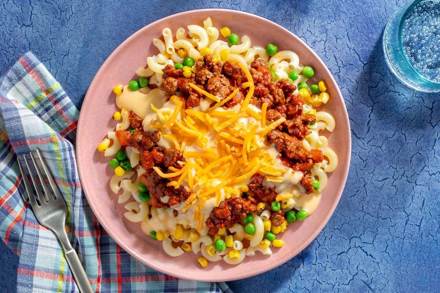 Cheesy macaroni and sloppy joe bake with corn and sweet peas