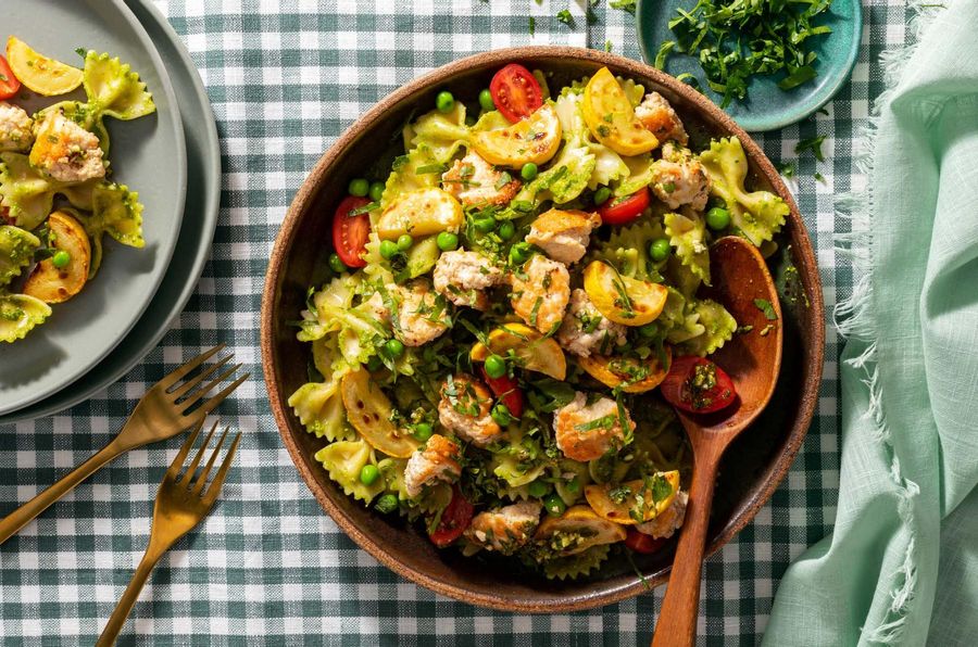 Farfalle with your choice of protein and arugula-pistachio pesto