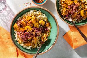 Indian fish curry with tamarind and onions over cauliflower 