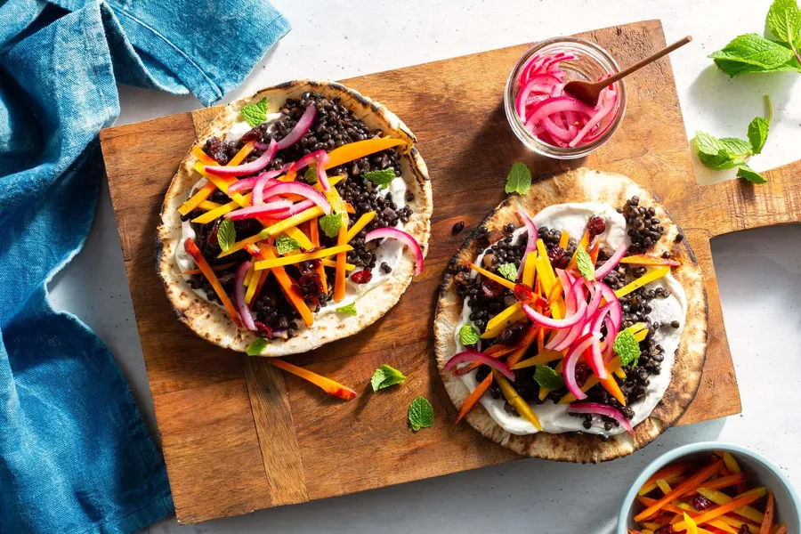 North African black lentil pitas with tangy carrot-cranberry salad