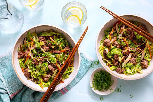 Pork egg roll in a bowl with stir-fried vegetables