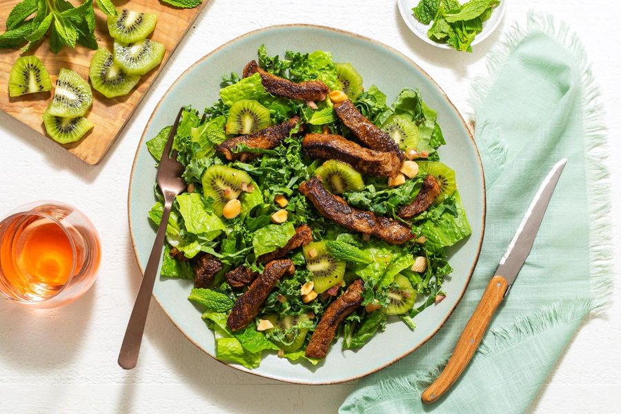 Spanish steak salad with kiwi, mint, and Marcona almonds