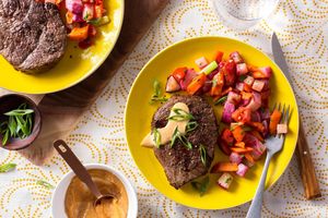 Steaks with roasted root vegetable succotash and aji amarillo