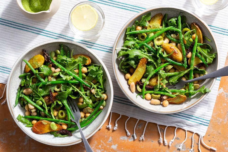 Mediterranean four-bean salad with pan-fried patatas and romesco verde