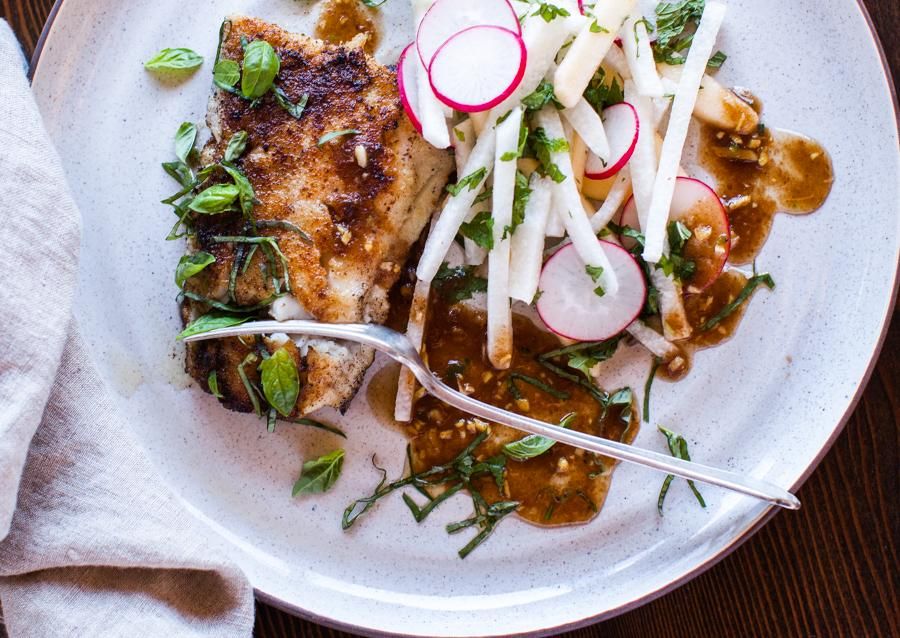 Tamarind-glazed fish with radish, jicama and Asian pear slaw 