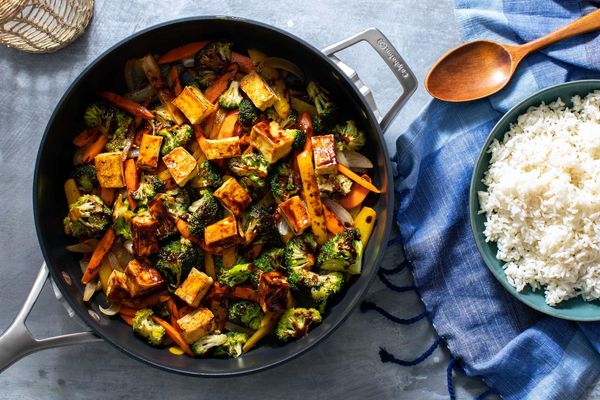 Hot and sour chicken stir-fry with vegetables and long-grain rice