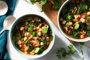 Gingery chickpea soup with quinoa, chard, and walnuts