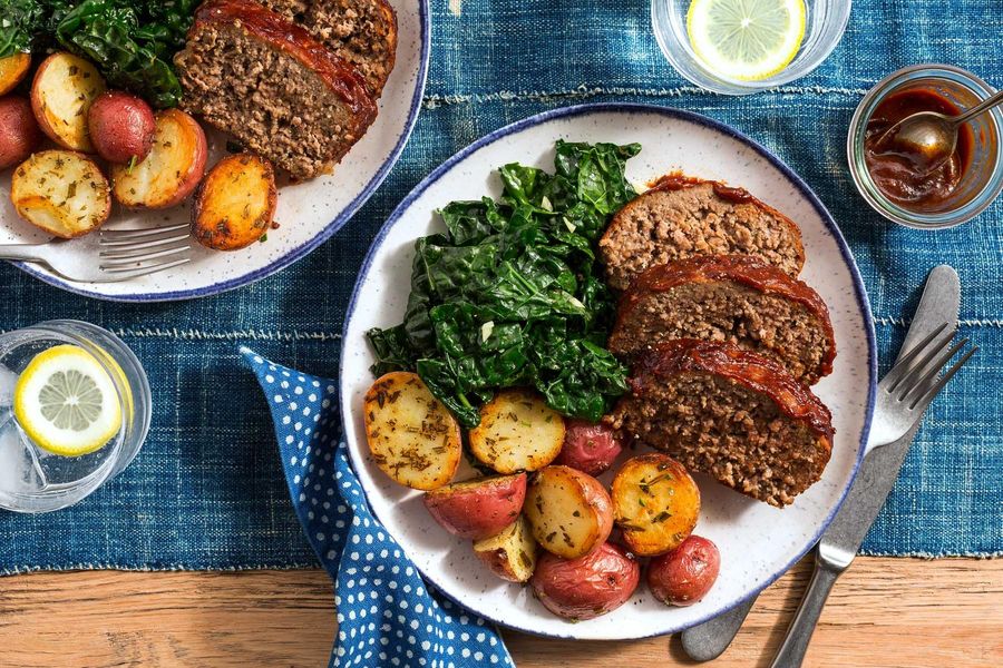 BBQ meatloaf with rosemary-roasted potatoes and garlicky greens