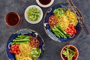 Hiyashi chuka salad with fresh ramen, egg ribbons, and crispy pancetta
