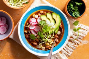 Pozole verde with mild green chiles, pinto beans, and avocado
