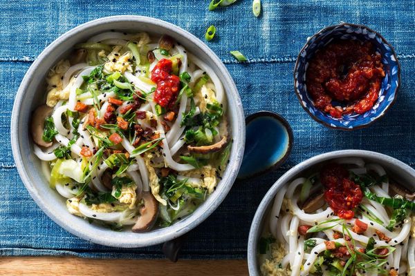 Japanese-style egg drop soup with udon, prosciutto, and bok choy