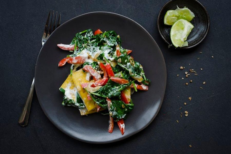 Cumin-spiced tofu and bell peppers with spinach and greek yogurt