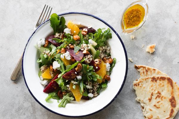 Beet, orange, and quinoa salad with goat cheese and curry vinaigrette