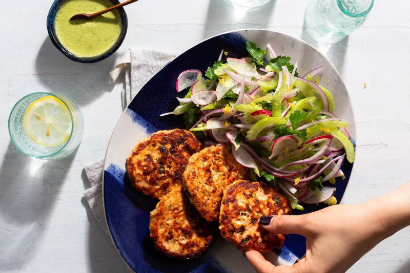 Salmon Cakes with Tahini Goddess Dressing and Celery-Radish Salad | Sunbasket